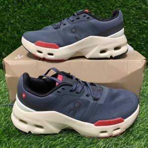 tenis on cloud grises suela blanca